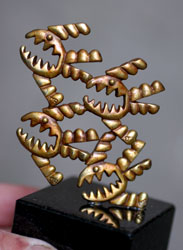 Lady pacman fish pen sculpture